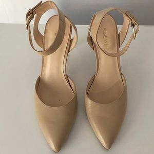 Nude pointed toe heels with ankle strap